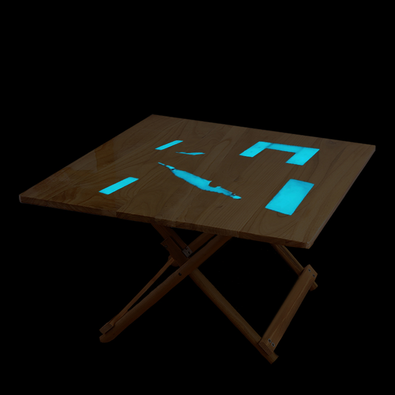 Glow in the Dark Powder Supplier – Bulk Photoluminescent Pigment & Expert Guide 25 An image of a wooden table featuring a glow-in-the-dark pattern, showcasing its unique luminescent design.