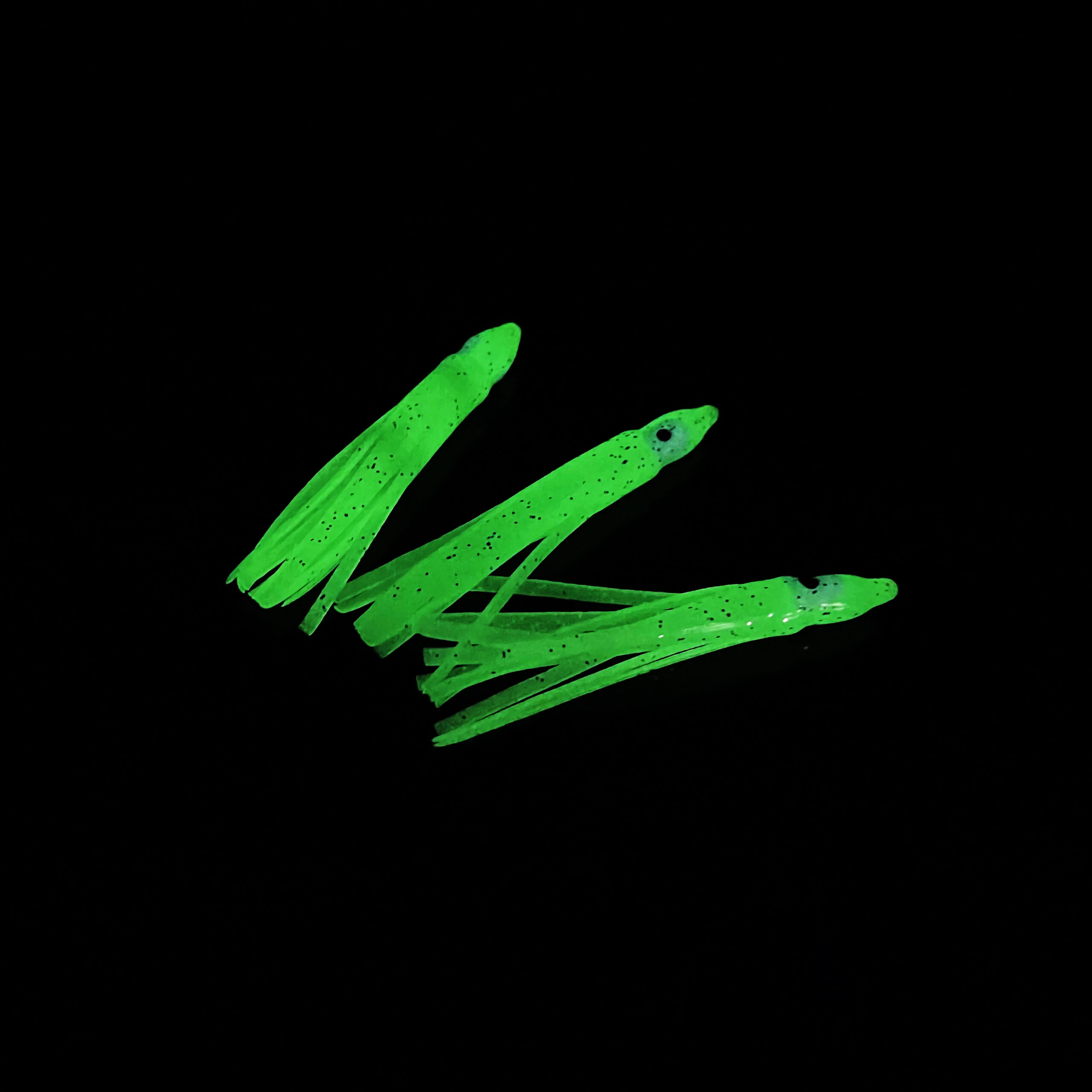 Glow in the Dark Powder Supplier – Bulk Photoluminescent Pigment & Expert Guide 33 An image of a yellow-green rubber squid-shaped bait made with GlowUp® glow-in-the-dark powder.